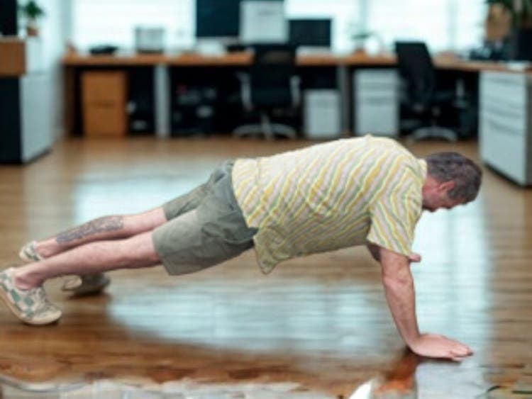 Teacher doing pushups