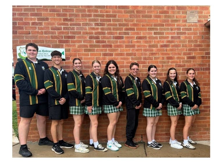 Student leaders standing in order of height