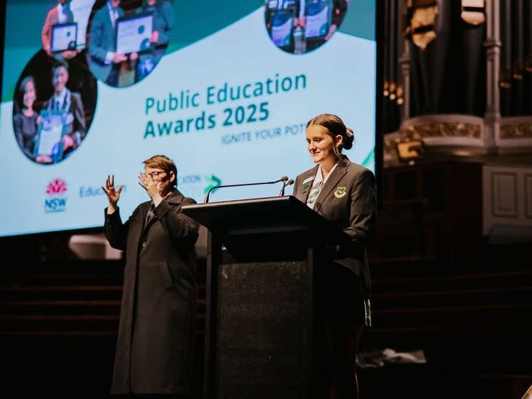 Student on stage at Public Education Awards