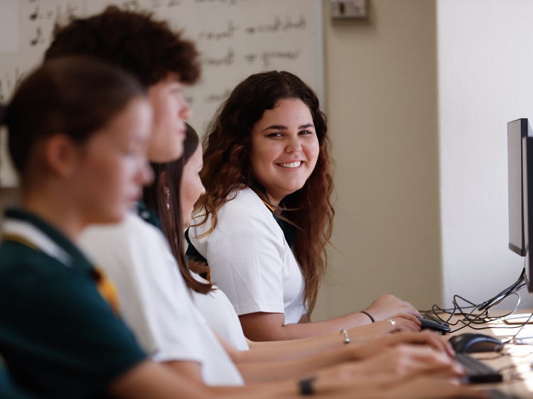 Students working on computers
